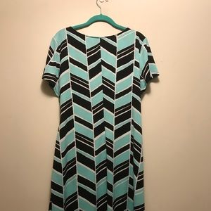 Teal, black, and white wrap dress